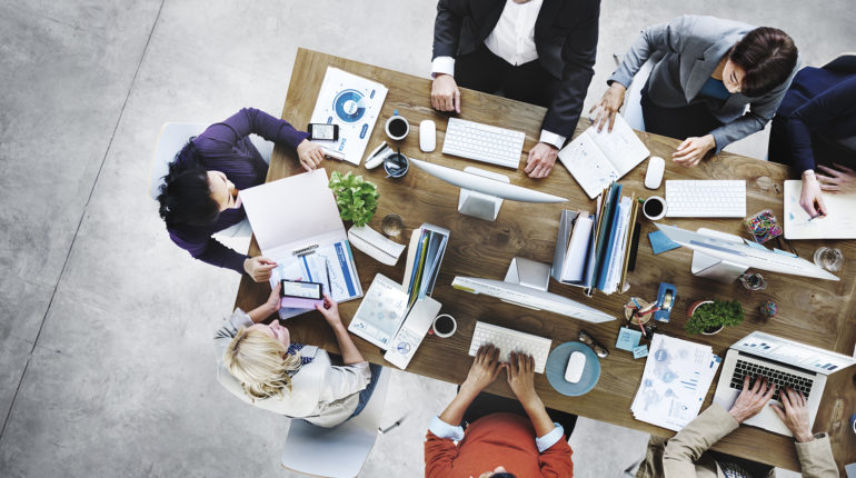 shutterstock_374127247 Group of Business People Working in the Office Concept